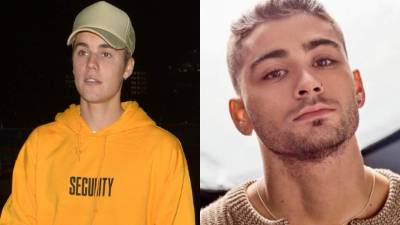 Los cantantes Justin Bieber y Zayn Malik.