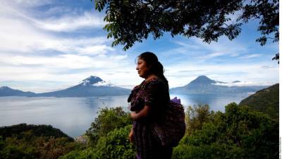 Guatemalan new President Alejandro Giammattei swears in during his inauguration ceremony at the National Theater, in Guatemala City, on January 14, 2020. - Giamattei assumes as president of Guatemala in replacement of the unpopular Jimmy Morales, with the promise of attacking corruption and contain the high levels of poverty. (Photo by Johan ORDONEZ / AFP)