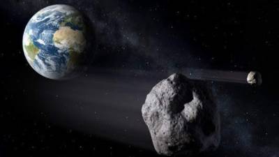 Recreación de un asteroide pasando cerca de la Tierra. ESA