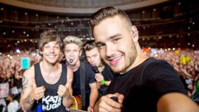 Louis Tomlinson, Niall Horan, Harry Styles y Liam Payne integran la banda 'One Direction'.