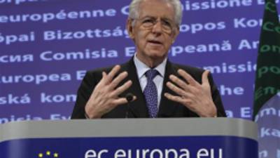 Italian Prime Minister Mario Monti speaks during a joint media conference with European Commission President Jose Manuel Barroso, not shown, at EU headquarters in Brussels, on Tuesday, Nov. 22, 2011. (AP Photo/Virginia Mayo)