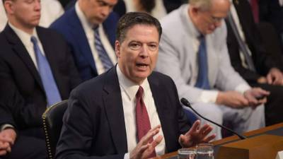 Former FBI Director James Comey testifies during a US Senate Select Committee on Intelligence hearing on Capitol Hill in Washington, DC, June 8, 2017.Fired FBI director James Comey took the stand Thursday in a crucial Senate hearing, repeating explosive allegations that President Donald Trump badgered him over the highly sensitive investigation Russia's meddling in the 2016 election. / AFP PHOTO / MANDEL NGAN