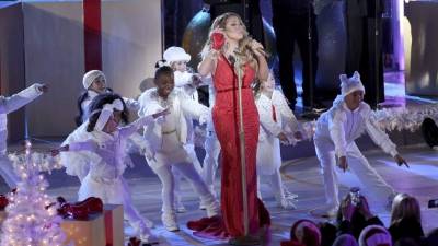 NEW YORK, NY - DECEMBER 03: Singer Mariah Carey performs at the 82nd Annual Rockefeller Center Christmas Tree Lighting on December 3, 2014 in New York City. (Photo by Paul Zimmerman/WireImage)