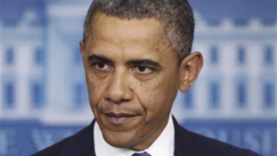 President Barack Obama pauses while he speaks to reporters in the Brady Press Briefing Room at the White House in Washington after meeting with Congressional leaders regarding the fiscal cliff, Friday, Dec. 28, 2012. (AP Photo/Charles Dharapak)