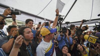 Los venezolanos esperan recaudar más de siete millones de firmas. Foto: AFP