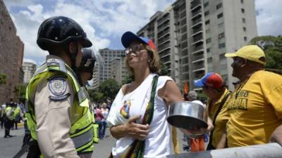 Los manifestantes se juntaron en una importante vía de la capital venezolana.