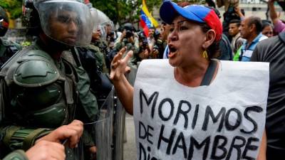 Los opositores al Gobierno de Maduro marcharon en Caracas y otras ciudades para exigir que el referendo revocatorio contra el presidente se convoque este año. Fotos: AFP
