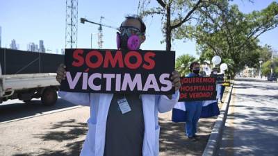 Médicos de Honduras han realizado protestas exigienado al gobierno una pronta vacunación. Foto: AFP