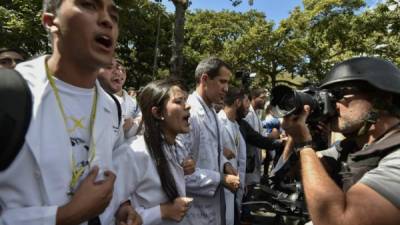 Los periodistas detenidos en Venezuela viajaron a ese país para cubrir la crisis política y las protestas contra Nicolás Maduro./AFP.