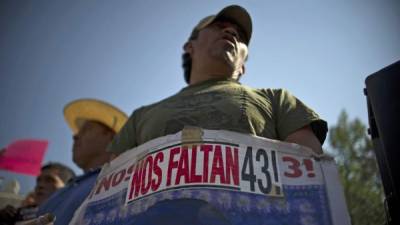 En el caso de Ayotzinapa se sospecha que hubo complicidad de la Policía y narcos. Foto: AFP/ Yuri Cortez