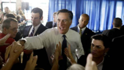 Republican presidential candidate, former Massachusetts Gov. Mitt Romney, greets supporters at his campaign headquarters in Jacksonville, Fla., Wednesday, Sept. 12, 2012. (AP Photo/Charles Dharapak)