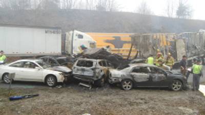 This photo provided by the Virginia State Police shows the scene following a 75-vehicle pileup on Interstate 77 near the Virginia-North Carolina border in Galax, Va., on Sunday, March 31, 2013. Virginia State Police say three people have been killed and more than 20 are injured and traffic is backed up about 8 miles. (AP Photo/Virginia State Police, Sgt. Mike Conroy)