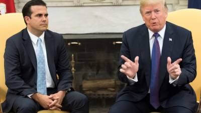 El presidente de EEUU, Donald Trump, junto al gobernador de Puerto Rico, Ricardo Rossello. EFE/Archivo