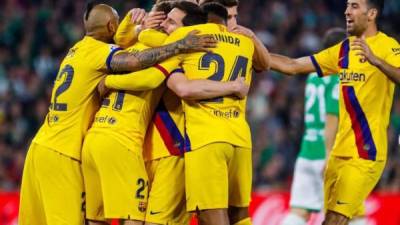 La plantilla del FC Barcelona festejó por todo lo alto la victoria ante Betis.