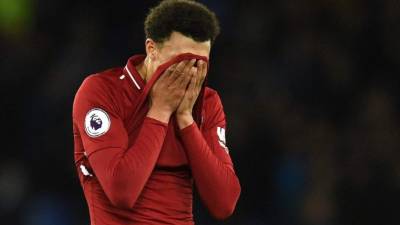 Goalscorer, Liverpool's English midfielder Curtis Jones (2nd L) celebrates with teammates on the pitch after the English FA Cup third round football match between Liverpool and Everton at Anfield in Liverpool, north west England on January 5, 2020. - Liverpool won the game 1-0. (Photo by Paul ELLIS / AFP) / RESTRICTED TO EDITORIAL USE. No use with unauthorized audio, video, data, fixture lists, club/league logos or 'live' services. Online in-match use limited to 120 images. An additional 40 images may be used in extra time. No video emulation. Social media in-match use limited to 120 images. An additional 40 images may be used in extra time. No use in betting publications, games or single club/league/player publications. /