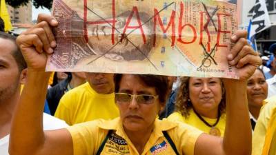 Los venezolanos han salido a las calles ha presionar por el revocatorio para Maduro. AFP