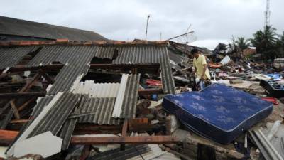 Era un tsunami ya ha provocado la muerte de más de 400 personas. AFP