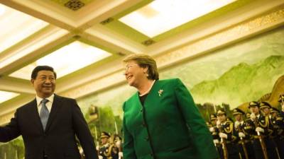 La presidenta chilena, Michelle Bachelet, y el presidente de China, Xi Jinping.