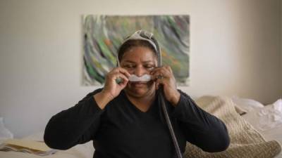 La inmigrante Rubiela Arias sufre de enfermedades respiratorias y mentales tras participar en las labores de limpieza de la zona cero./AFP.