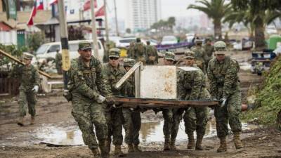 El número de muertos a causa del terremoto ocurrido la noche del pasado miércoles en el norte de Chile asciende ya a doce, informó hoy el ministro del Interior, Jorge Burgos, quien señaló que además hay cinco desaparecidos.