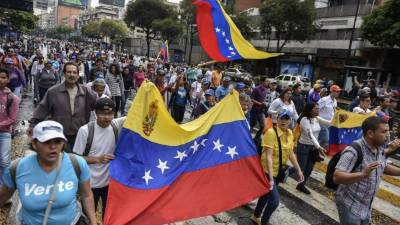 Miles de venezolanos marchan contra Nicolán Maduro. Foto: AFP