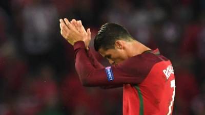 Cristiano Ronaldo lamentó profundamente el haber fallado un penal tan importante para su selección / AFP PHOTO / FRANCISCO LEONG