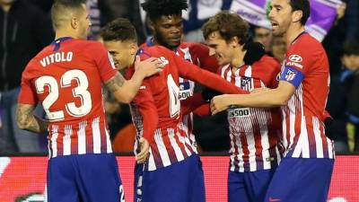 Los jugadores del Atlético de Madrid celebrando uno de los goles de Griezmann en Valladolid. Foto AFP
