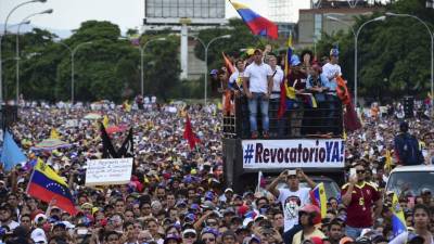 Manifestantes en Caracas el pasado 26 de octubre. Foto: AFP/Ronaldo Schemidt