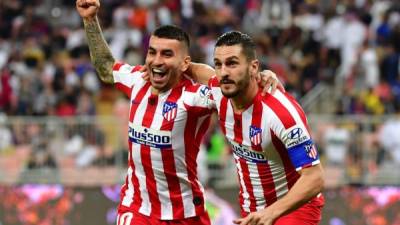 Ángel Correa y Koke celebrando el primer gol del Atlético de Madrid ante el Barcelona.