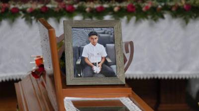 Foto de archivo de un menor víctima de la violencia en Honduras.