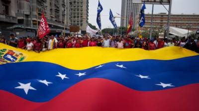 La oposición venezolana presiona desde la calle para sacar a Maduro del poder.