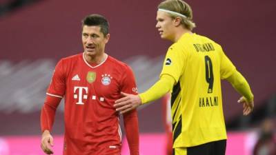 Robert Lewandowski y Erling Braut Haaland tuvieron un gran duelo en el clásico Bayern Múnich - Dortmund. Foto AFP.