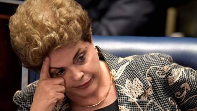 Dilma Rousseff está a pocas horas de ser separada por completo de su cargo. Fotos: AFP/Evaristo Sa