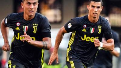 Dybala y Cristiano Ronaldo, las figuras de la Juventus. Foto AFP