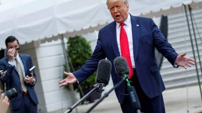 Trump anunció que usará mascarilla ante el repunte de casos de coronavirus.