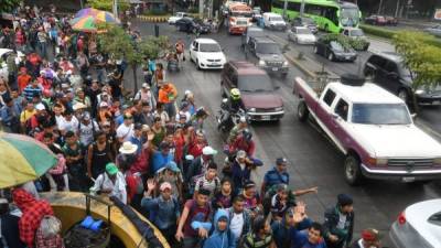 El ministro dijo que los hondureños que no han cumplido con las leyes migratorias guatemaltecas han sido regresados a su país. Foto: AFP