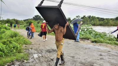 Las lluvias en Honduras han disminuido y de a poco los ciudadanos que evacuaron vuelven a sus casas.