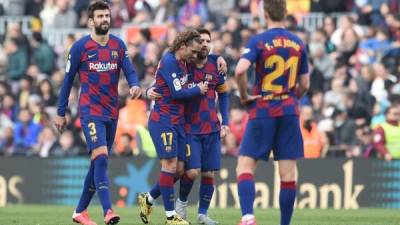 Griezmann se encargó de abrir el marcador en el Camp Nou luego de una espectacular asistencia de Messi. Foto AFP.