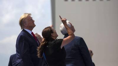 US President Donald Trump speaks to the press before boarding Air Force One as he departs from Joint Base Andrews in Maryland on May 30, 2020. - Trump travels to Kennedy Space Center in Florida to watch the launch of the manned SpaceX Demo-2 mission to the International Space Station. (Photo by MANDEL NGAN / AFP)