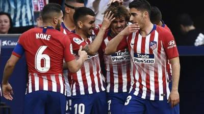 Griezmann anotó un espectacular gol de tiro libre. FOTO AFP.