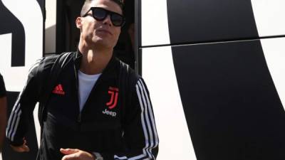 Juventus' Portuguese forward Cristiano Ronaldo arrives for the friendly football match between Juventus A and Juventus B in Villar Perosa, on August 14, 2019. (Photo by Isabella BONOTTO / AFP)