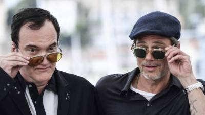 Quentin Tarantino y Brad Pitt durante una rueda de prensa para presentar 'Once Upon a Time... in Hollywood' en el Festival de Cannes 2019. CHRISTOPHE SIMON / AFP