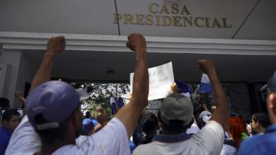 Simpatizantes del Bloque de Oposición Ciudadana, que integran los partidos Nacional, Alianza Patriótica y Salvador de Honduras (PSH). Fotos: EFE/Gustavo Amador