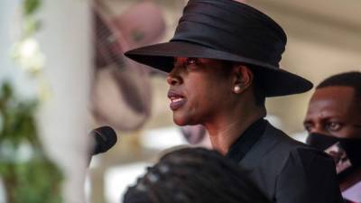 Martine Moïse speaks during the funeral for her husband, slain Haitian President Jovenel Moïse, on July 23, 2021, in Cap-Haitien, Haiti, the main city in his native northern region. - Moïse, 53, was shot dead in his home in the early hours of July 7. (Photo by Valerie Baeriswyl / AFP)