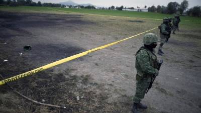 Militares resguardaban el lugar en donde ocurrió la explosión.