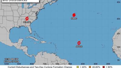 Imagen cedida este viernes por el Centro Nacional de Huracanes (NHC) estadounidense donde se muestra la localización de las tormentas tropicales Helene (i-arriba) y Joyce (abajo) y el huracán Isaac (d) en el Atlántico.