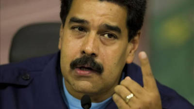 El presidente de Venezuela, Nicolás Maduro, fue registrado ayer viernes al ofrecer una rueda de prensa, en el Salón Simón Bolívar del Palacio de Miraflores, en Caracas (Venezuela). EFE