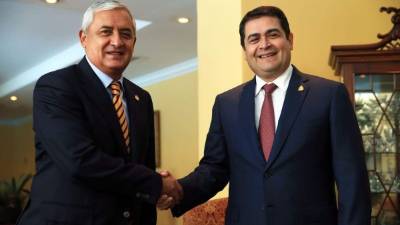 El presidente de Honduras, Juan Orlando Hernández, y su homólogo de Guatemala, Otto Pérez Molina.