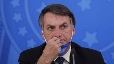 El mandatario brasileño, Jair Bolsonaro, ha recibido una lluvia de críticas por su polémico decreto que perjudica a millones de empleados./AFP.