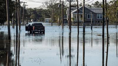 El Centro Nacional de Huracanes dijo que Claudette continúa generando fuertes lluvias y peligrosas inundaciones al suroeste de EEUU. FOTO: EFE/Dan Anderson